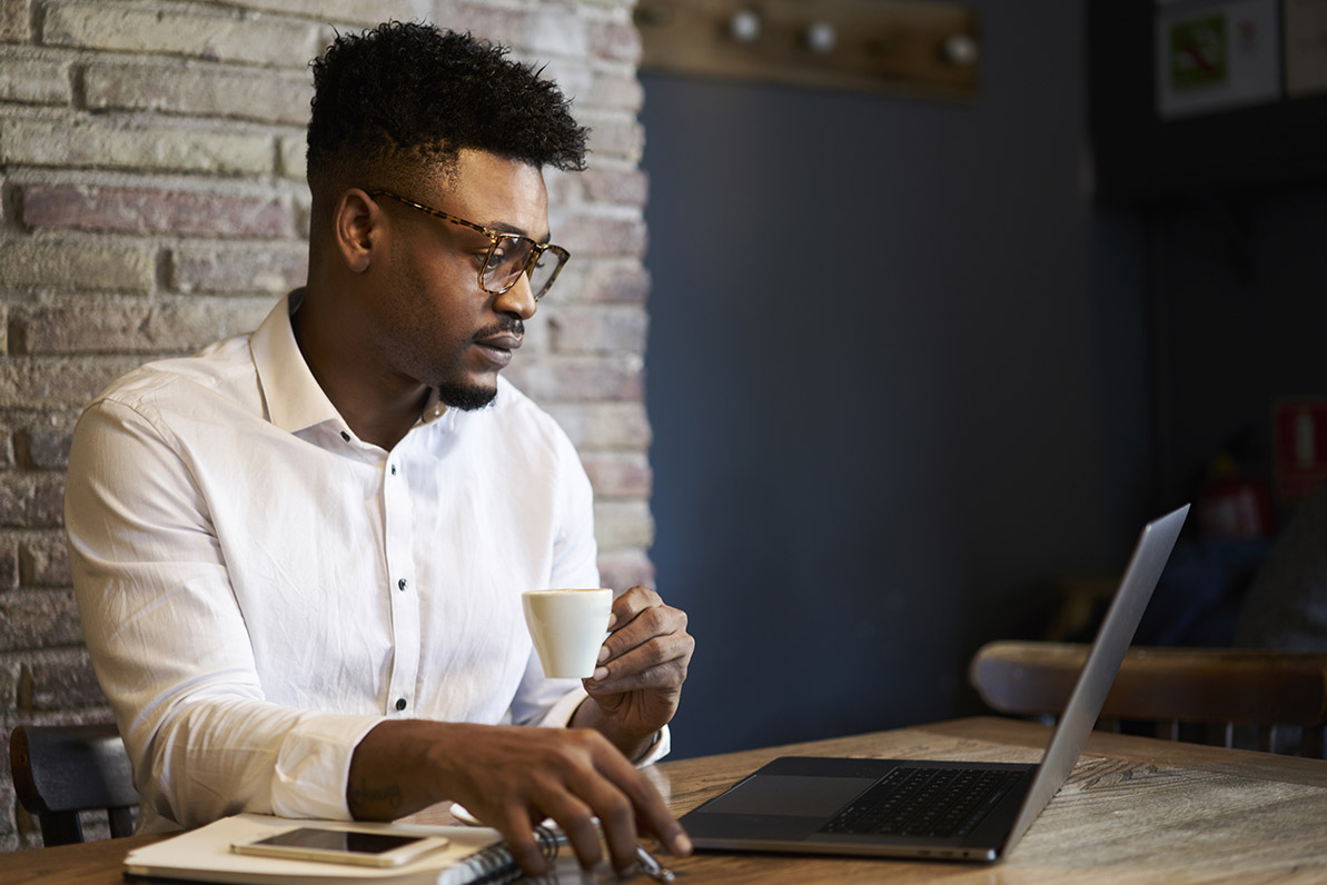 A man working at a laptop